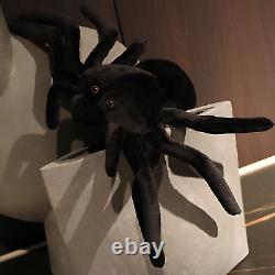 Peluche d'araignée douce et câline en fourrure noire, adorable pour jouer